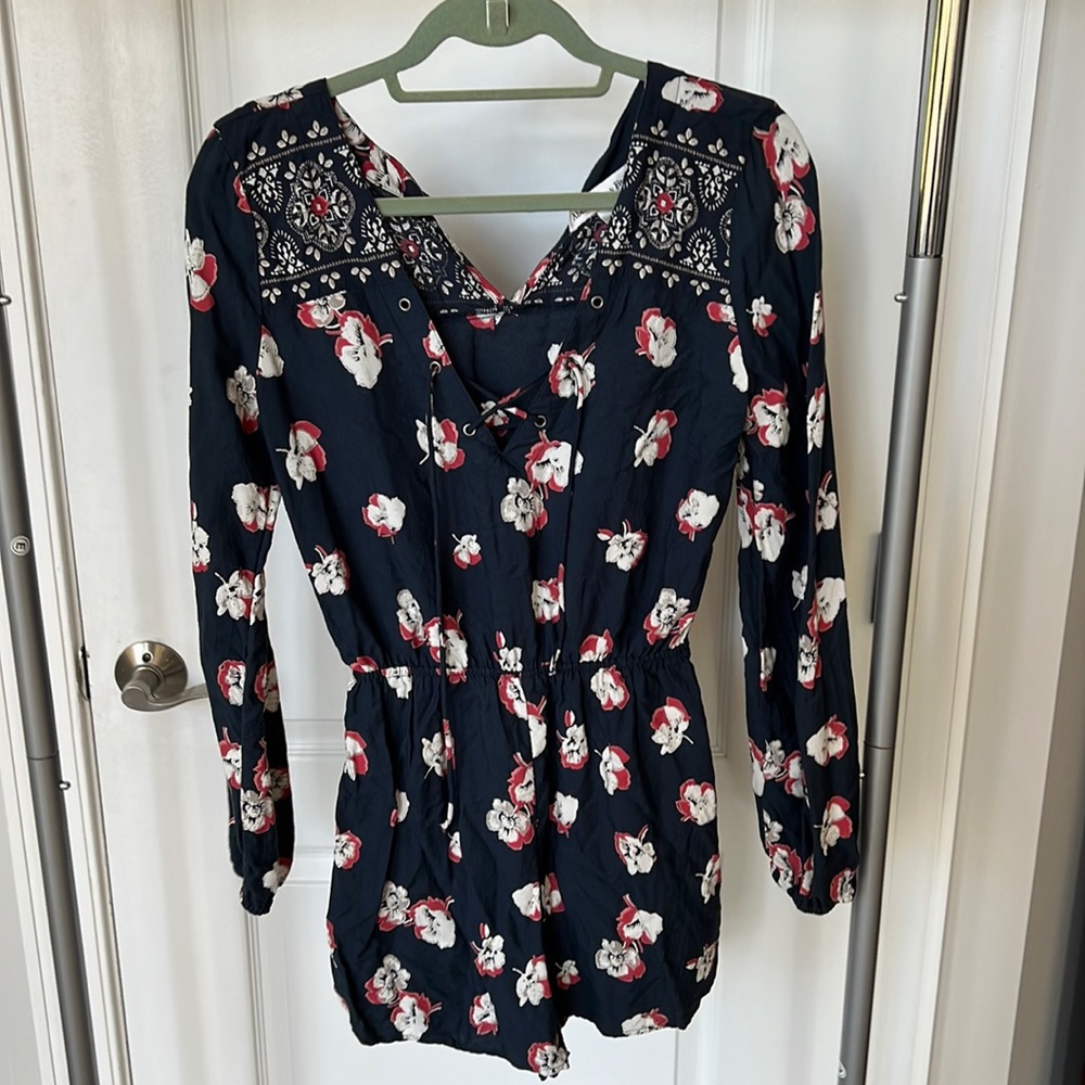 Flowered long sleeve romper with front tie